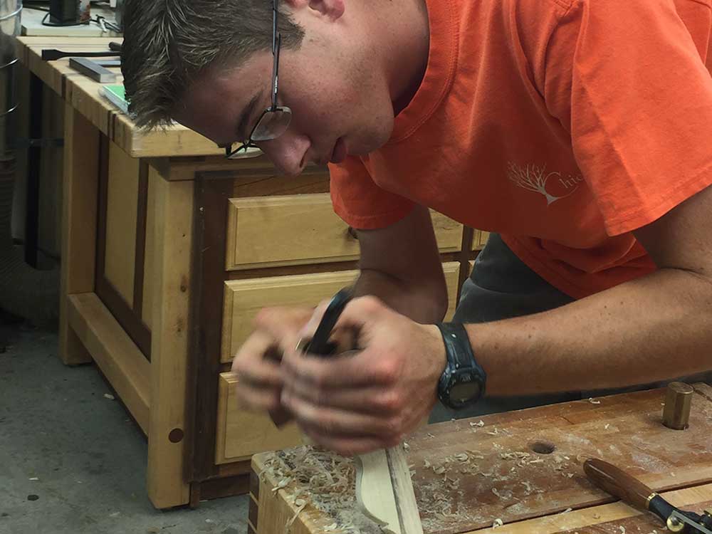 carving a Windsor chair hand