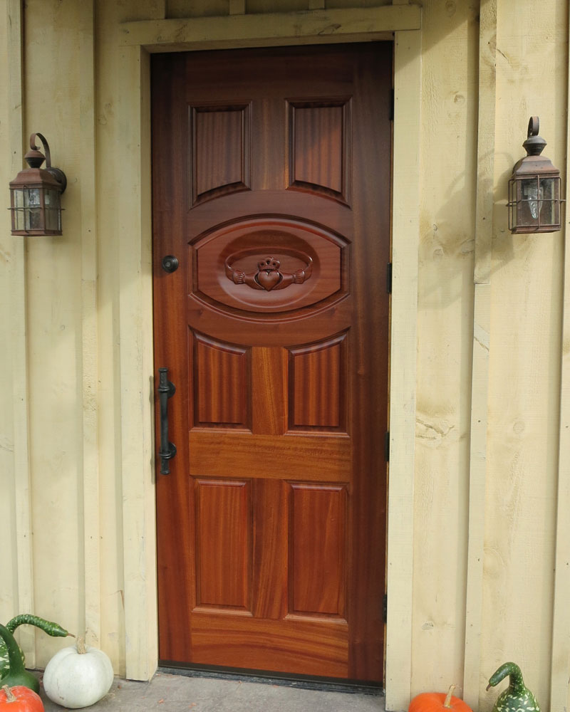 Custom carved solid mahogany exterior door